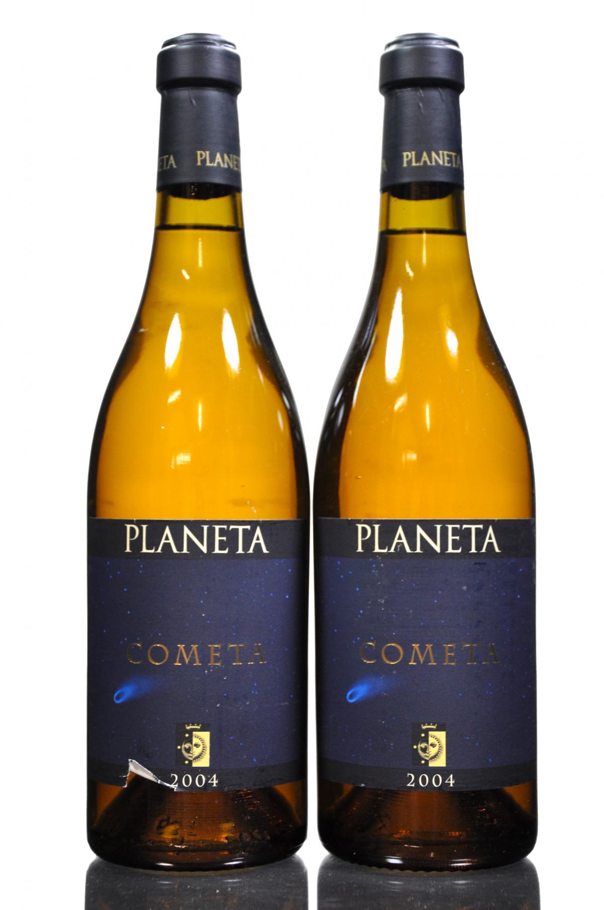 2 x Planeta Cometa 2004